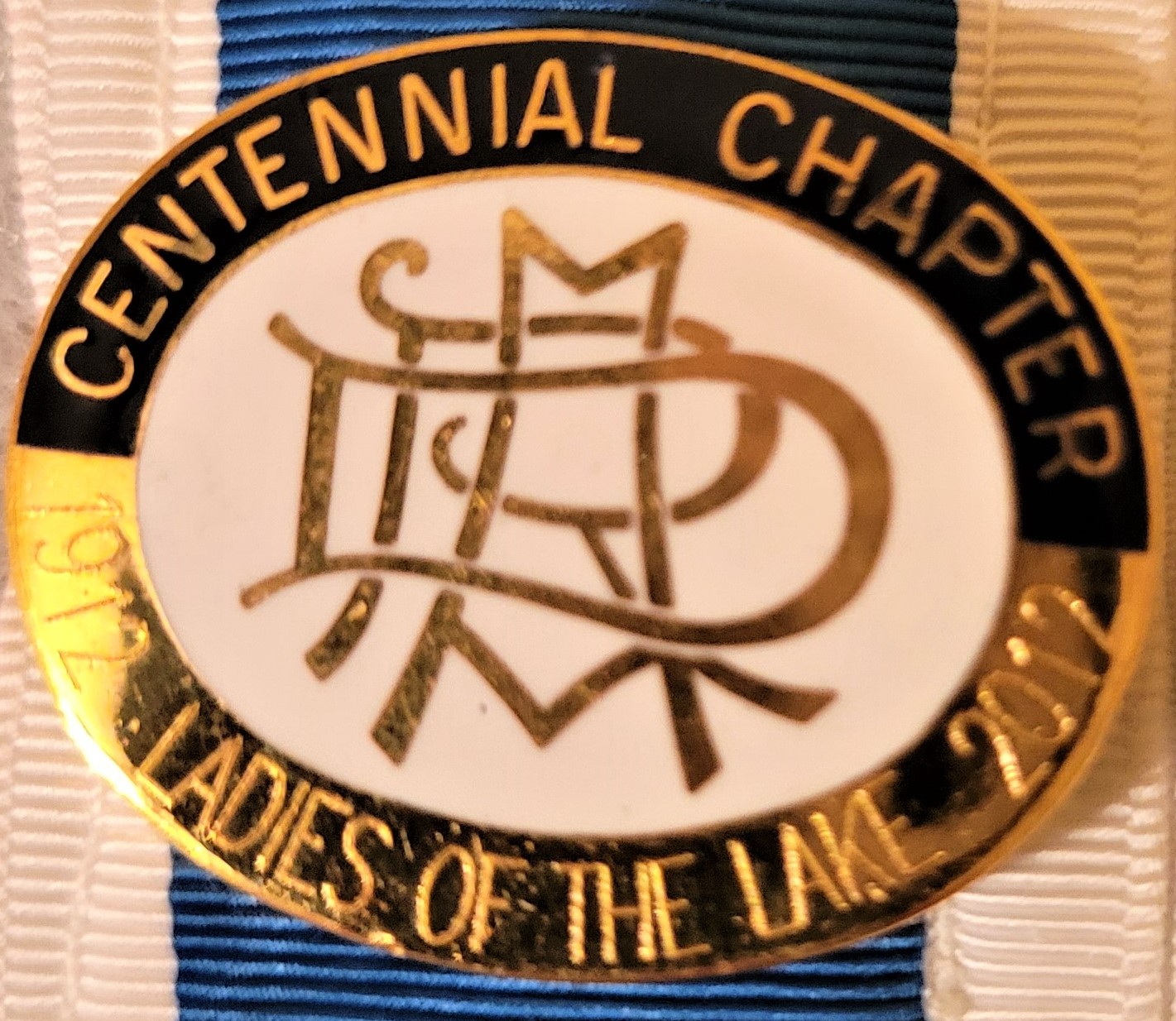 Centennial
                              pin